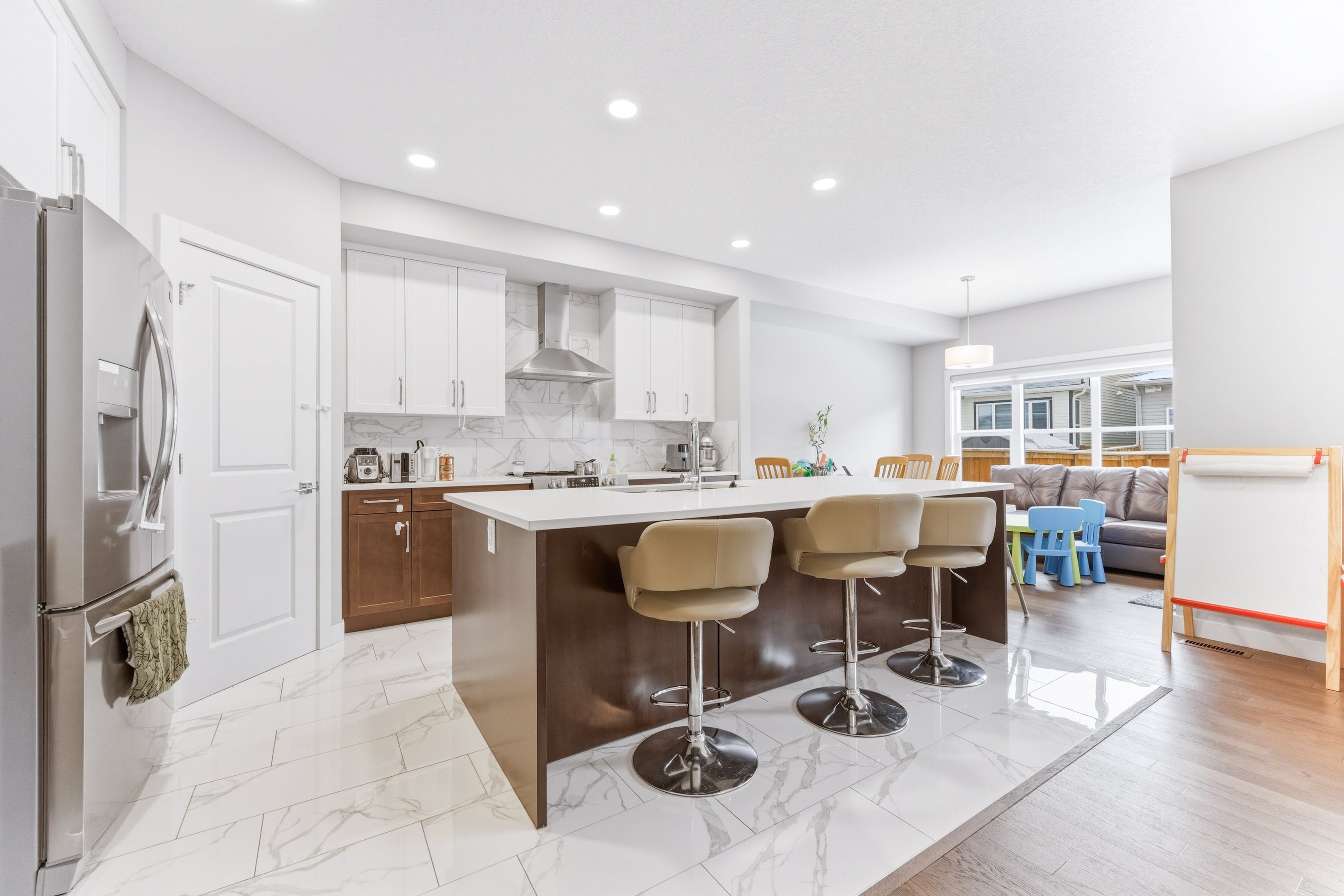 Kitchen and family living space in a Calgary single-family home